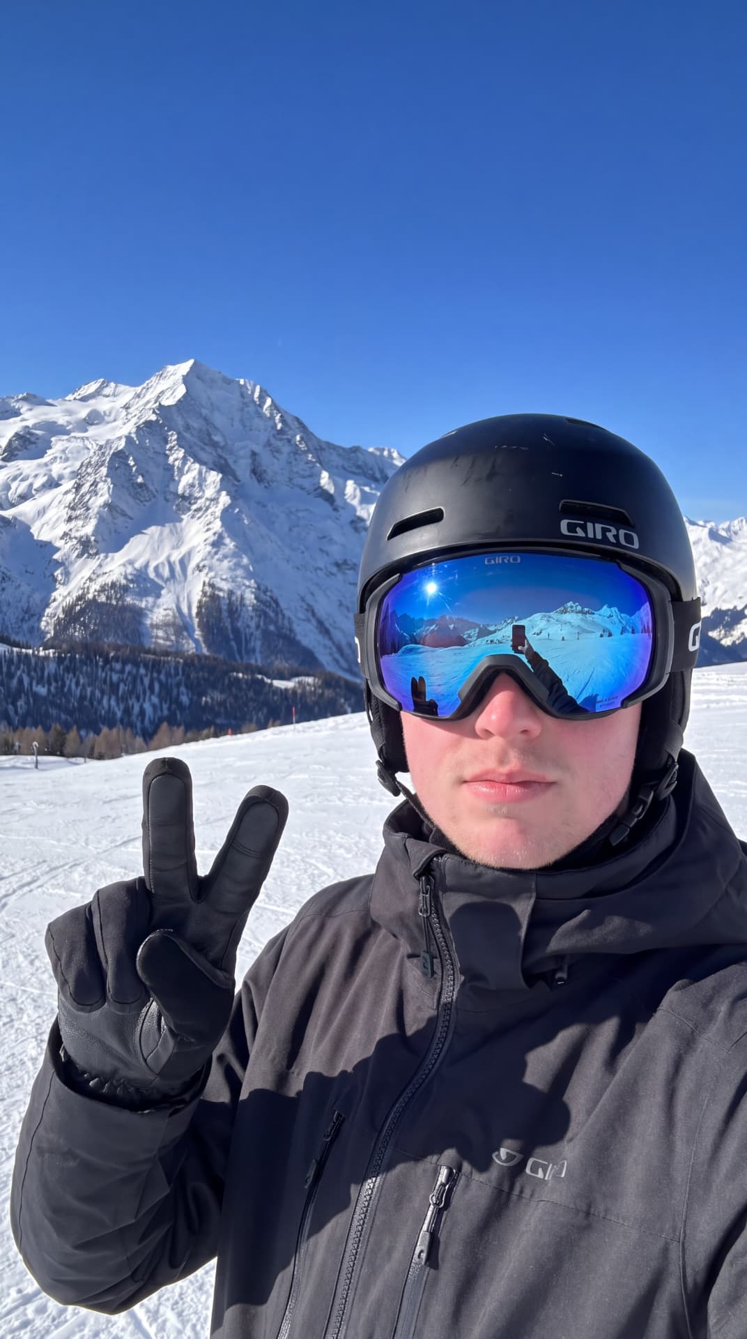 Creator skiing in the mountains