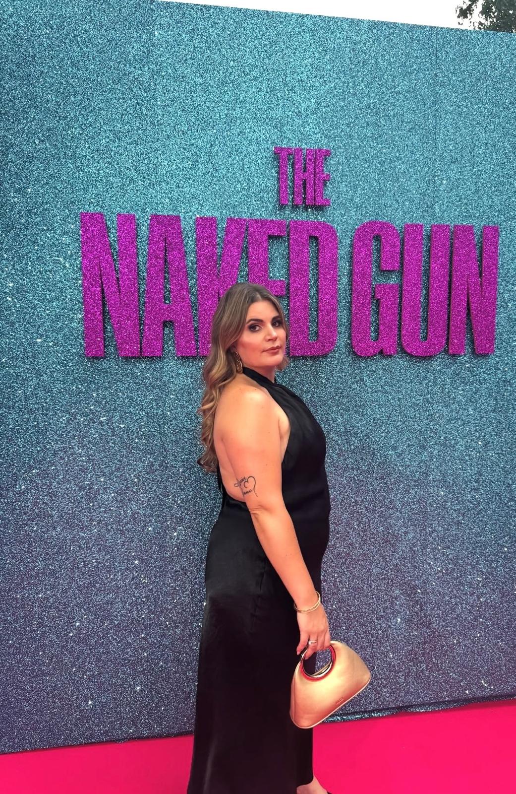 Creator at a film premiere on the pink carpet